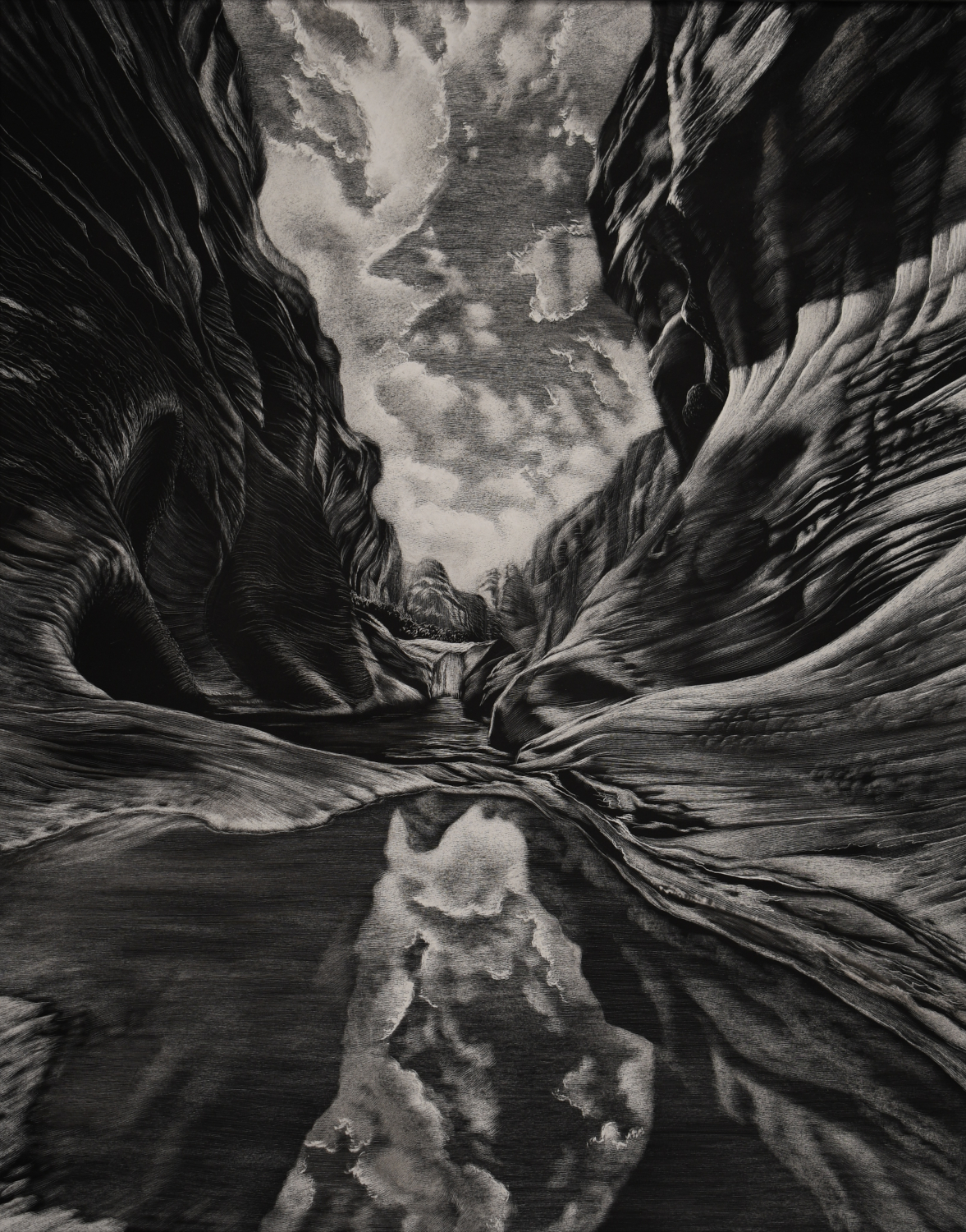 The image is in black and white because it is a photograph of black and white scratchboard art by Lindsey Kiser. The artwork is of a narrow canyon in Red Cliffs National Conservation Area 15 minutes north of St George, Utah. Between the canyon walls is a small triangular glimpse of sky filled with fluffy clouds and beneath is a puddle of water that reflects those clouds. To the left and right of the sky images are soft shades of gray forming smooth, organic forms of the curvilinear canyon walls.